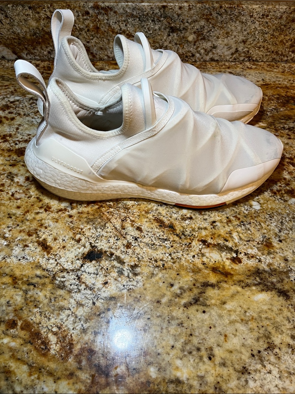 Y-3 Ultraboost 22 sneakers in the "Triple White" colorway